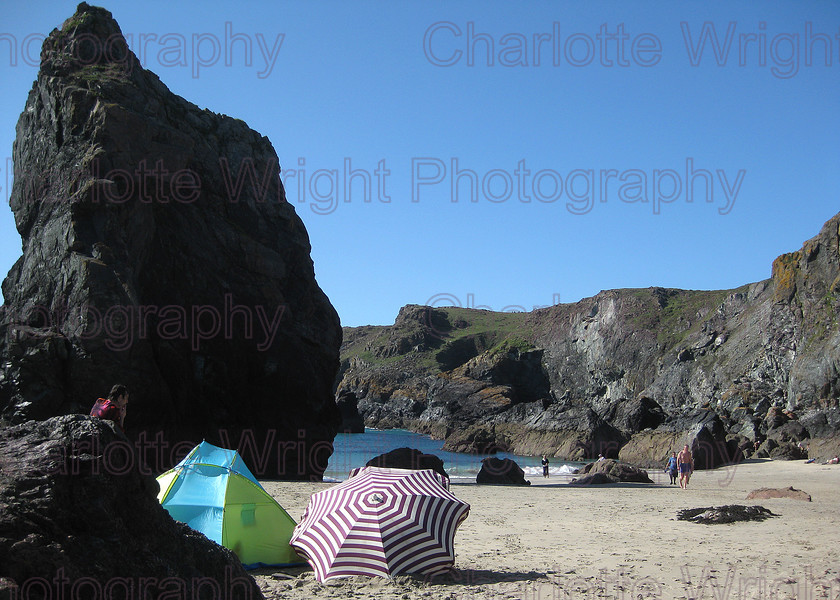 IMG 2133 
 Kynance Cove beach in Cornwall. A fantastic beach, and two lovely beach umbrellas. Photographed by myself, Charlotte Wright Photography 
 Keywords: Kynance Cove, beach, sea, sand, umbrellas, cornwall, United Kingdom, photography